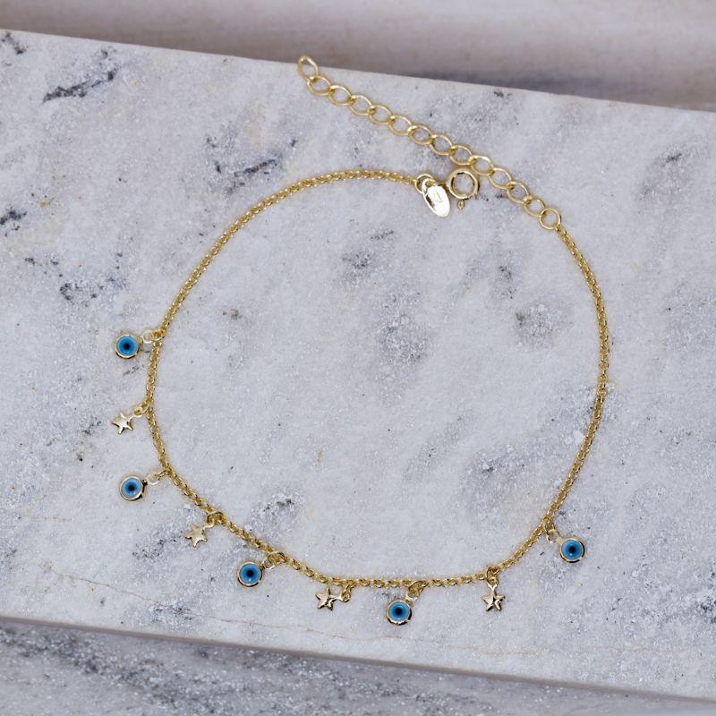 TORNOZELEIRA OLHO GREGO E ESTRELAS BANHO OURO 18K