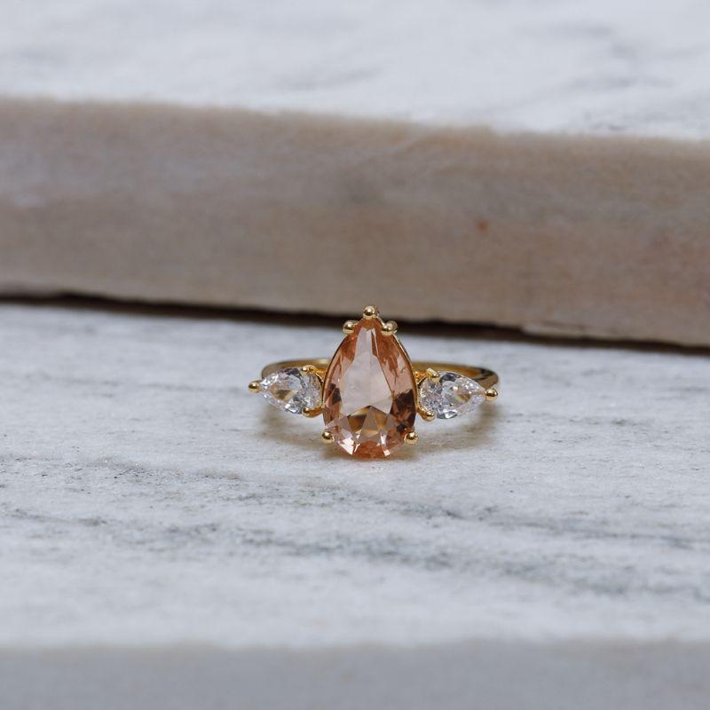 ANEL GOTA CRISTAL PEACH BANHO OURO 18K