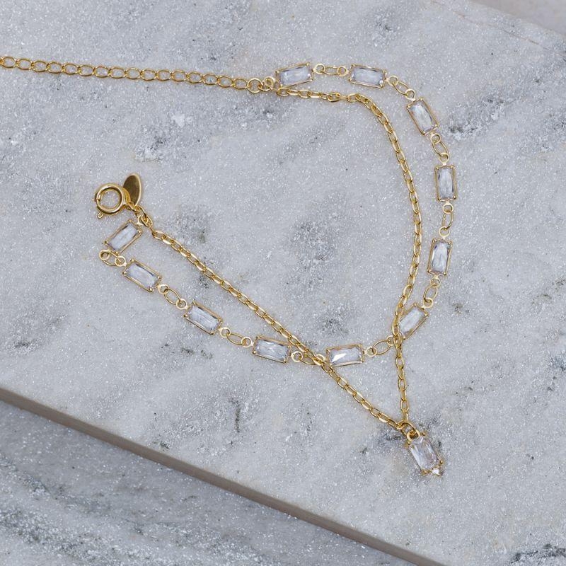 PULSEIRA DUPLA COM CRISTAIS QUADRADOS BANHO OURO 18K