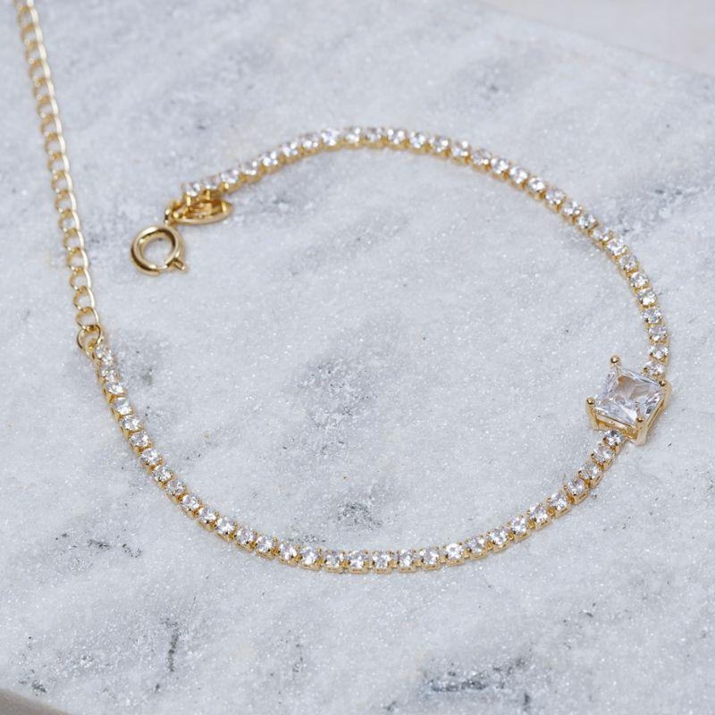 PULSEIRA RIVIERA P CRISTAL BANHO OURO 18K