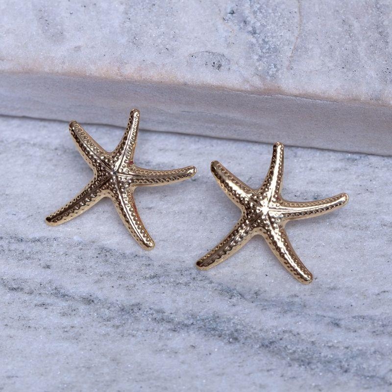 BRINCO ESTRELA DO MAR TRABALHADA BANHO OURO 18K