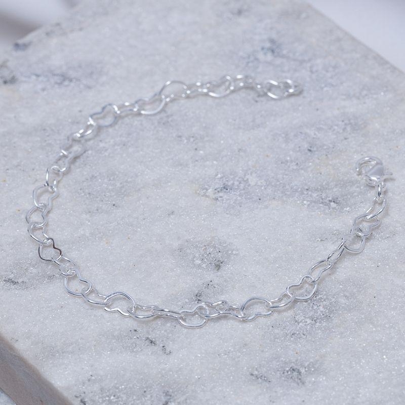 PULSEIRA ELOS DE CORAÇÃO M BANHO PRATA