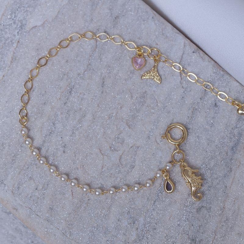 PULSEIRA PÉROLA COM PINGENTES DO MAR BANHO OURO 18K