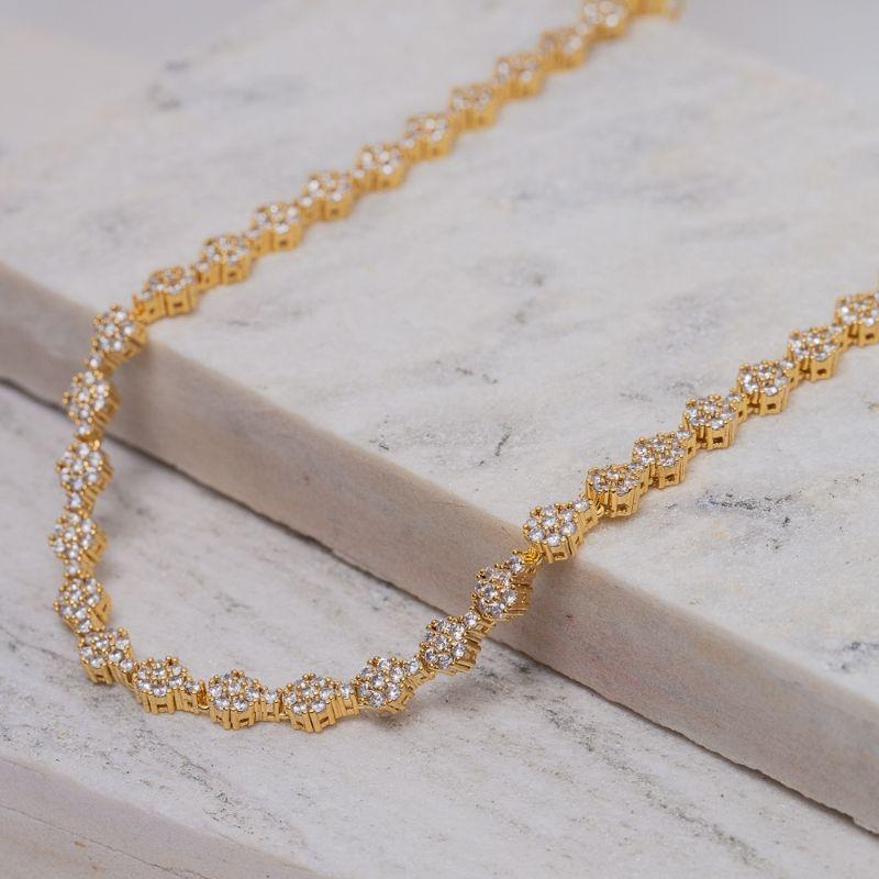 COLAR RIVIERA FLOR CRAVEJADO COM ZIRCÔNIAS CRISTAIS BANHO OURO 18K