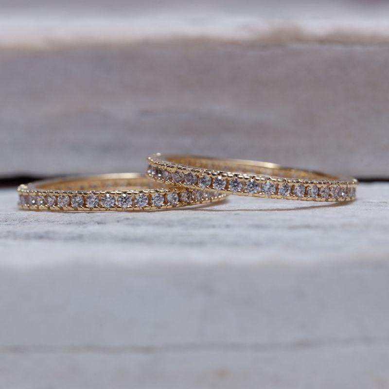 ANEL APARADOR CRAVEJADO COM ZIRCÔNIAS BANHO OURO 18K