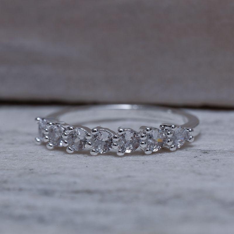 ANEL CORAÇÕES CRISTAIS 3 GARRAS BANHO OURO 18K