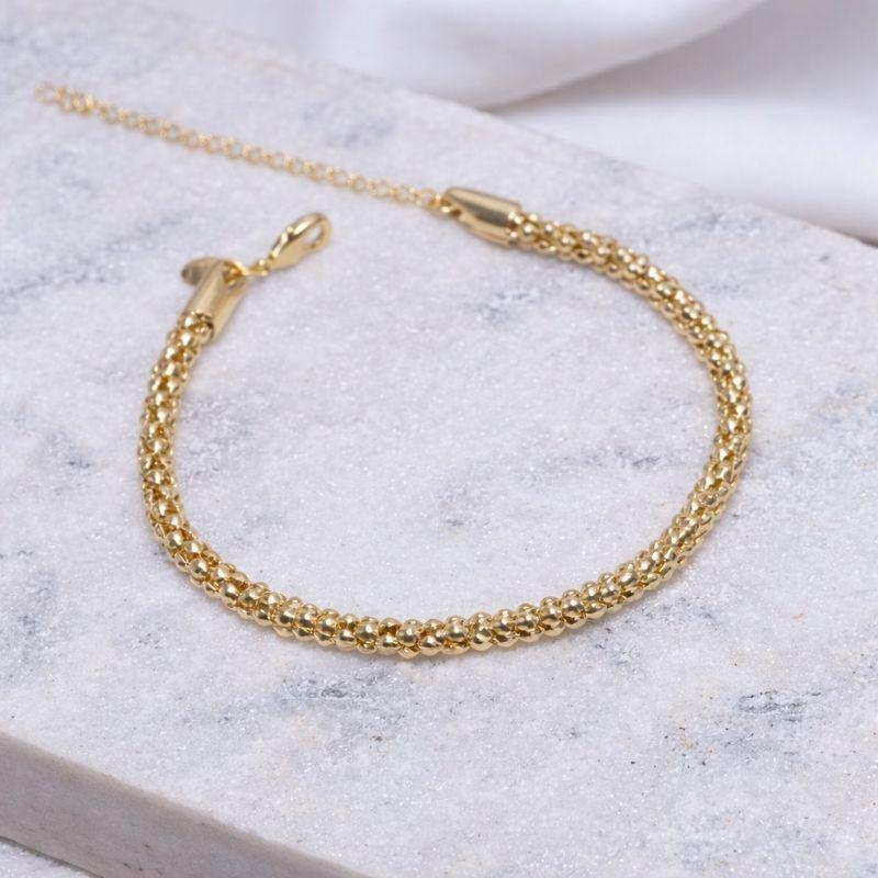 PULSEIRA GROSSA OCA BANHO OURO 18K