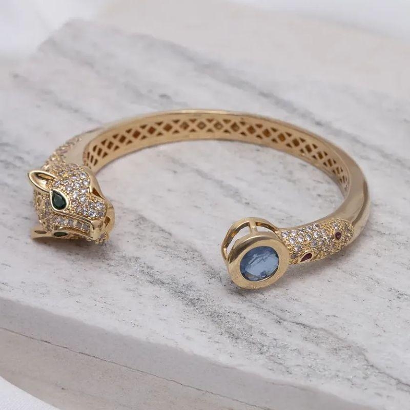 BRACELETE TIGRE COM ZIRCÔNIAS E PEDRA AZUL BANHO OURO 18K