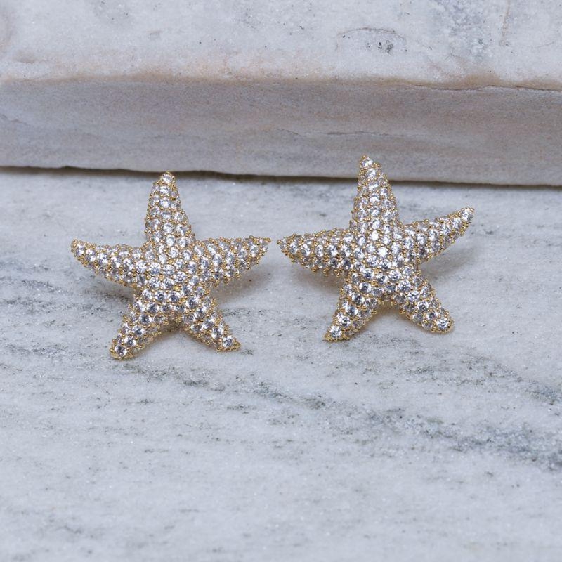 BRINCO ESTRELA DO MAR M CRISTAL BANHO OURO18K