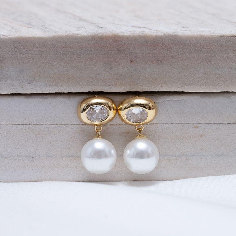 BRINCO PÉROLA COM BASE CRISTAL BANHO OURO 18K