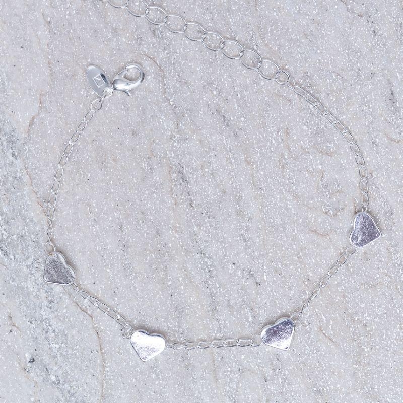 PULSEIRA CORAÇÕES LISOS BANHO PRATA