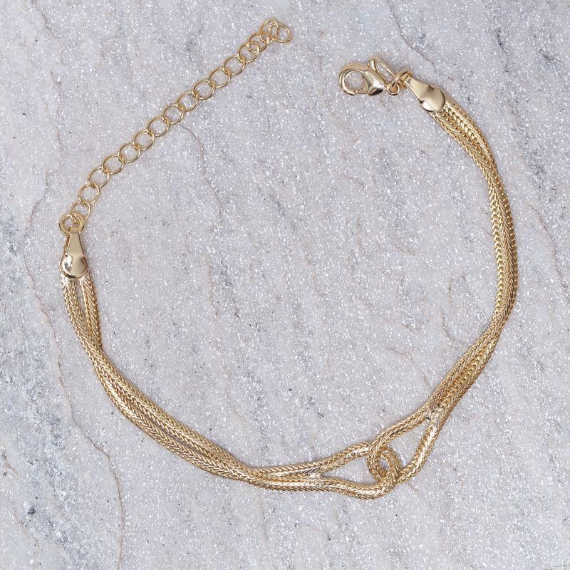 PULSEIRA FITA ENTRELAÇADA BANHO OURO 18K