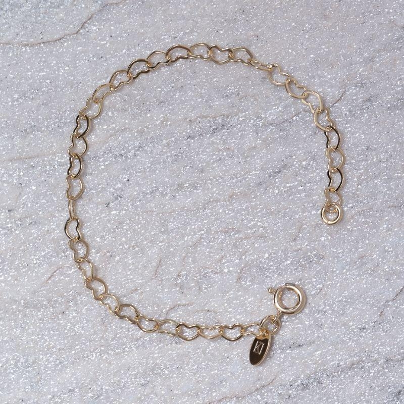 PULSEIRA INFANTIL ELOS CORAÇÕES VAZADOS BANHO OURO 18K