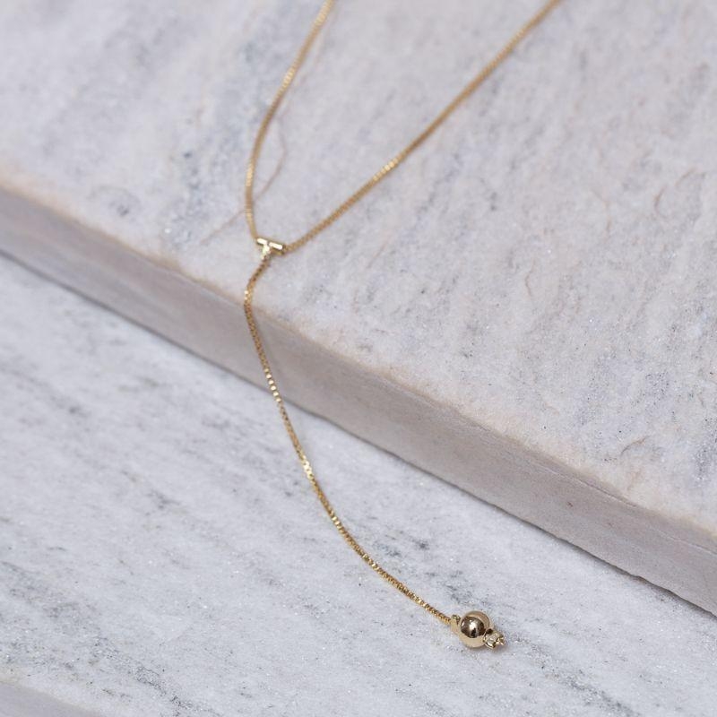 COLAR PÊNDULO COM BOLINHA BANHO OURO 18K