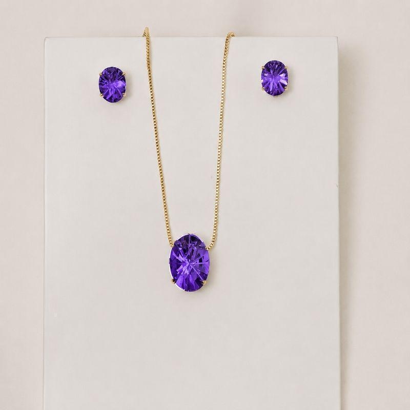 CONJUNTO CRISTAL OVAL ROXO BANHO OURO 18K