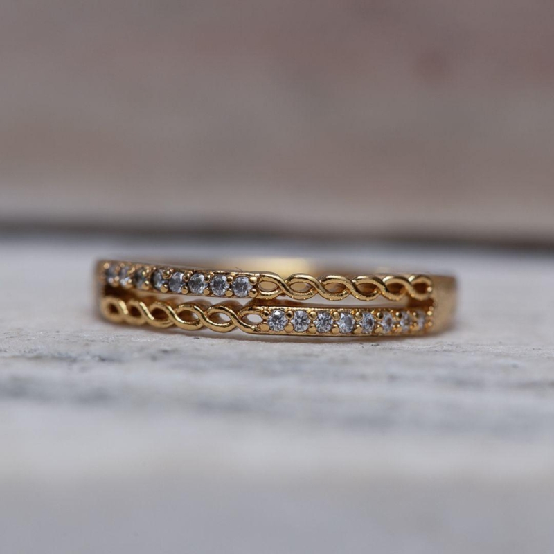 ANEL DUPLO COM ZIRCÔNIAS CRISTAIS CT BANHO OURO 18K