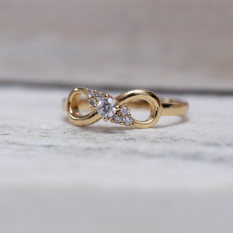 ANEL LAÇO COM ZIRCÔNIAS CT BANHO OURO 18K