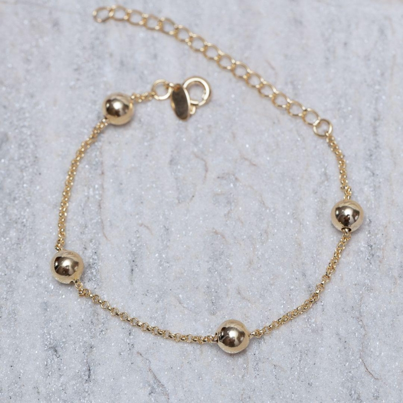 PULSEIRA BOLINHAS M BANHO OURO 18K