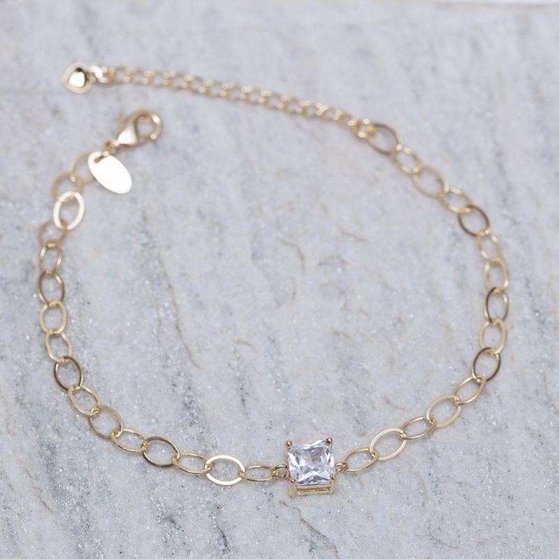 PULSEIRA ELOS OVAIS COM PONTO DE LUZ BANHO 18K