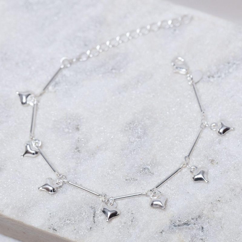 PULSEIRA PINGENTES CORAÇÕES CT BANHO PRATA