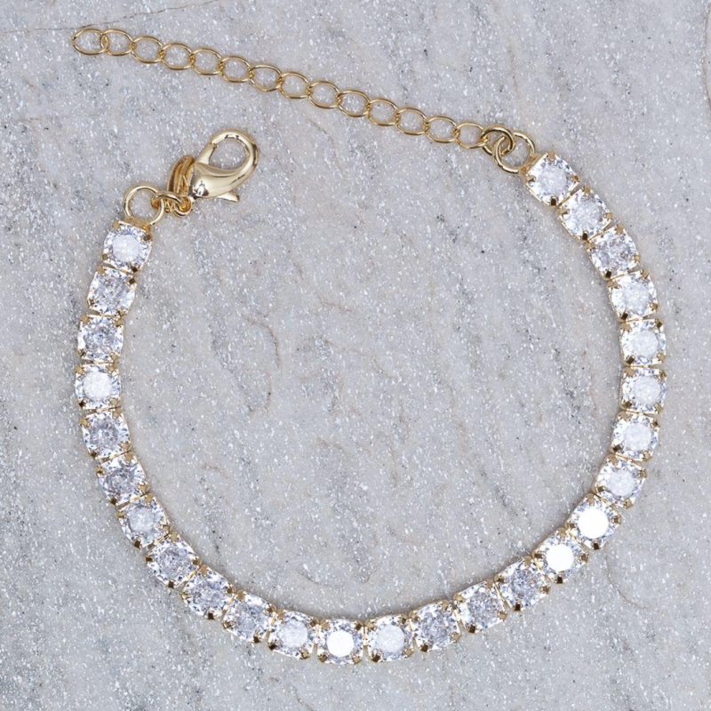 PULSEIRA RIVIERA GROSSA CRISTAL BANHO OURO 18K