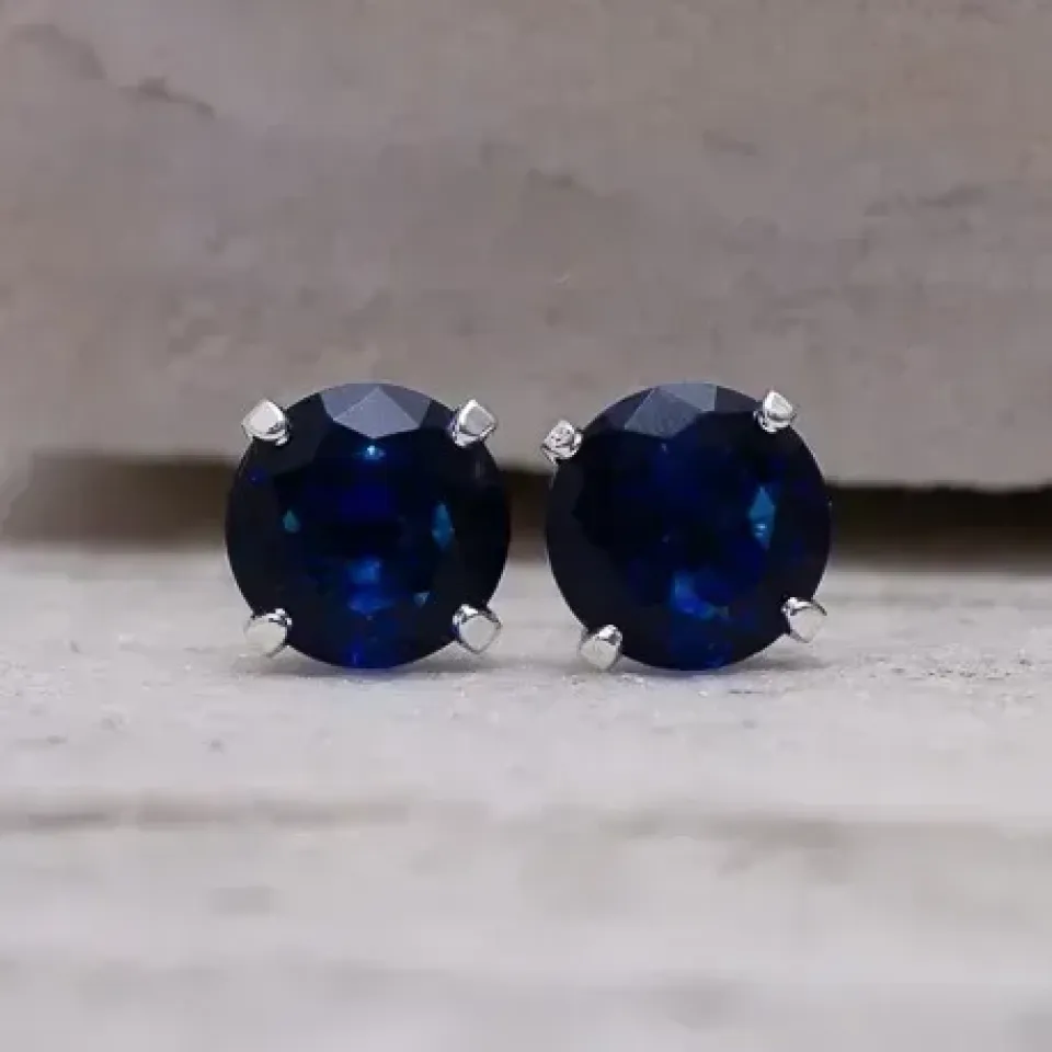 BRINCO PONTO DE LUZ ZIRCÔNIA AZUL MARINHO PEQUENO BANHO PRATA