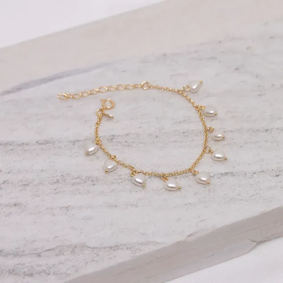 PULSEIRA CORAÇÃO EM PÉROLA BANHO OURO 18K
