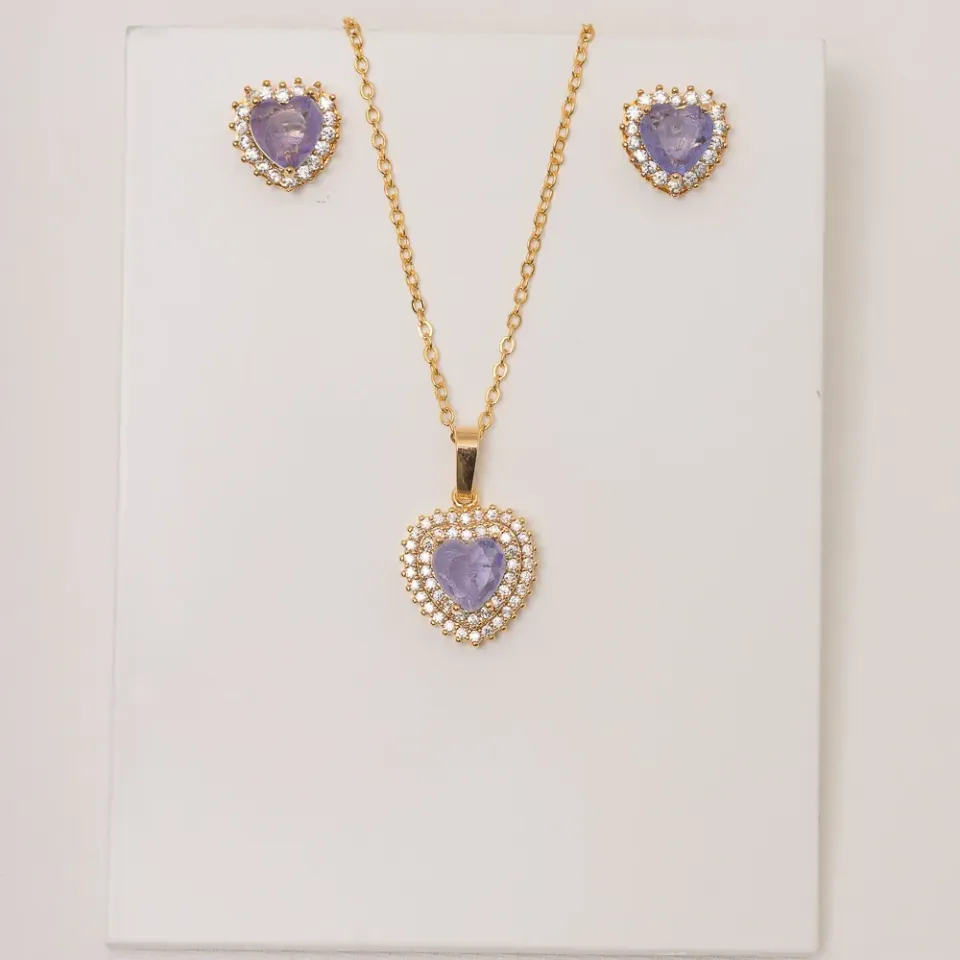 CONJUNTO CORAÇÃO COM PEDRA ZIRCÔNIA ROXA BANHO OURO 18K