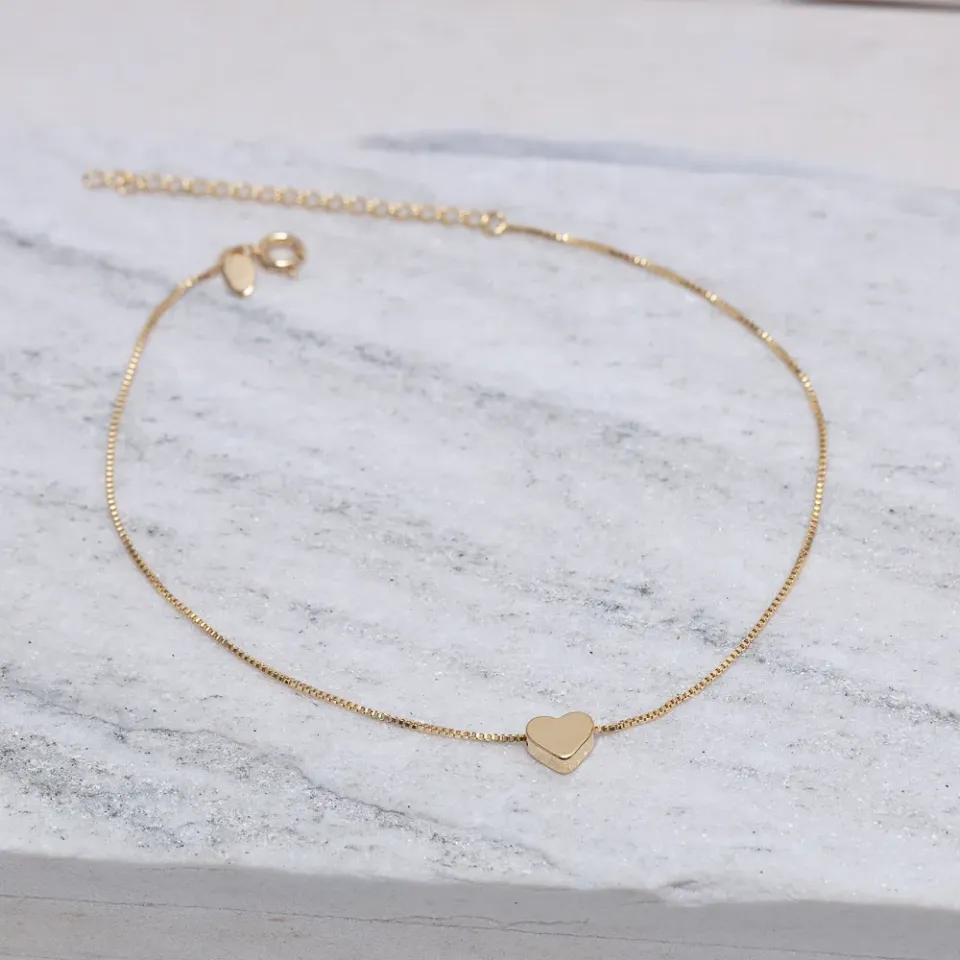 TORNOZELEIRA VENEZIANA COM CORAÇÃO LISO BANHO OURO 18K