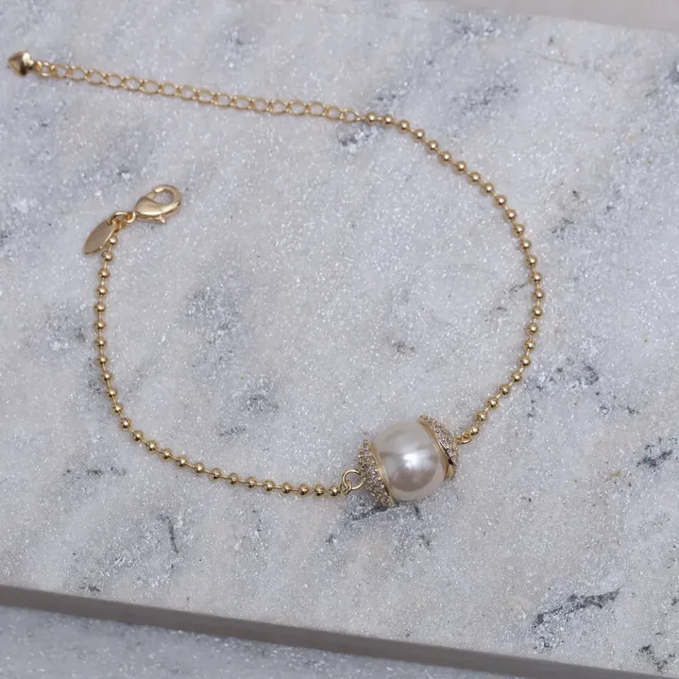 PULSEIRA PÉROLA COM ZIRCÔNIAS BANHO OURO 18K