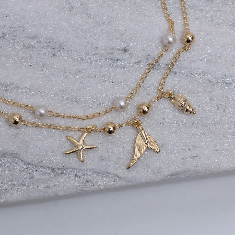 TORNOZELEIRA CORRENTE DUPLA MAR BANHO OURO 18K