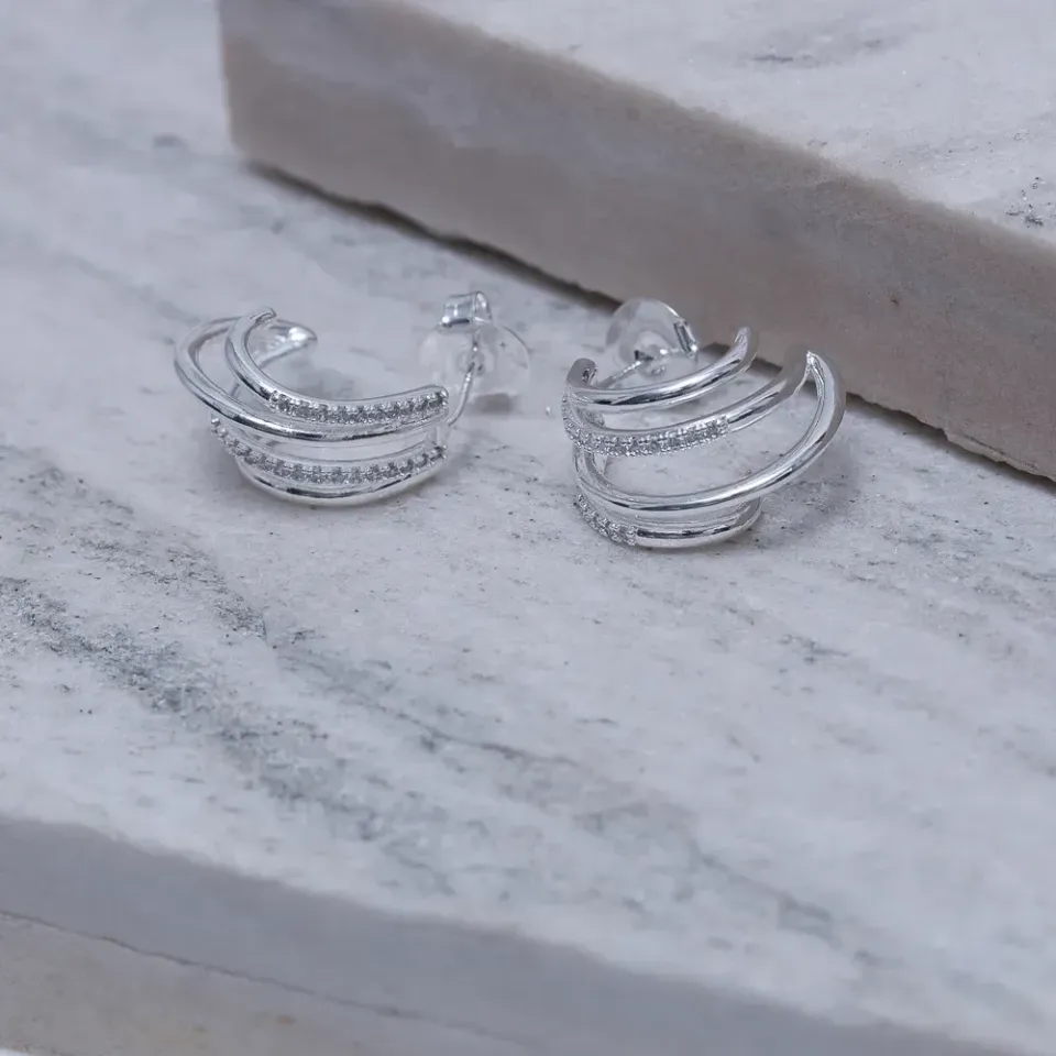 BRINCO QUATRO AROS COM ZIRCÔNIA BANHO OURO 18K