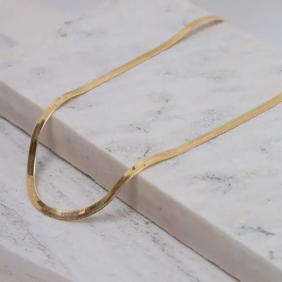 CHOKER FITA GROSSA LAMINADA BANHO OURO 18K