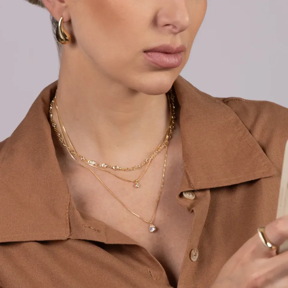 BRINCO GOTA LISA M BANHO OURO 18K