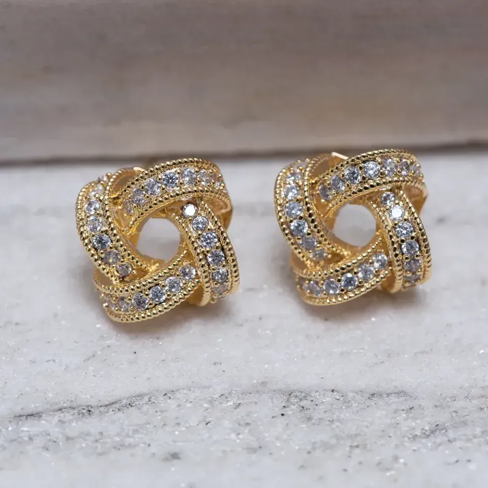 BRINCO CRAVEJADO TRANÇADO BANHO OURO 18K