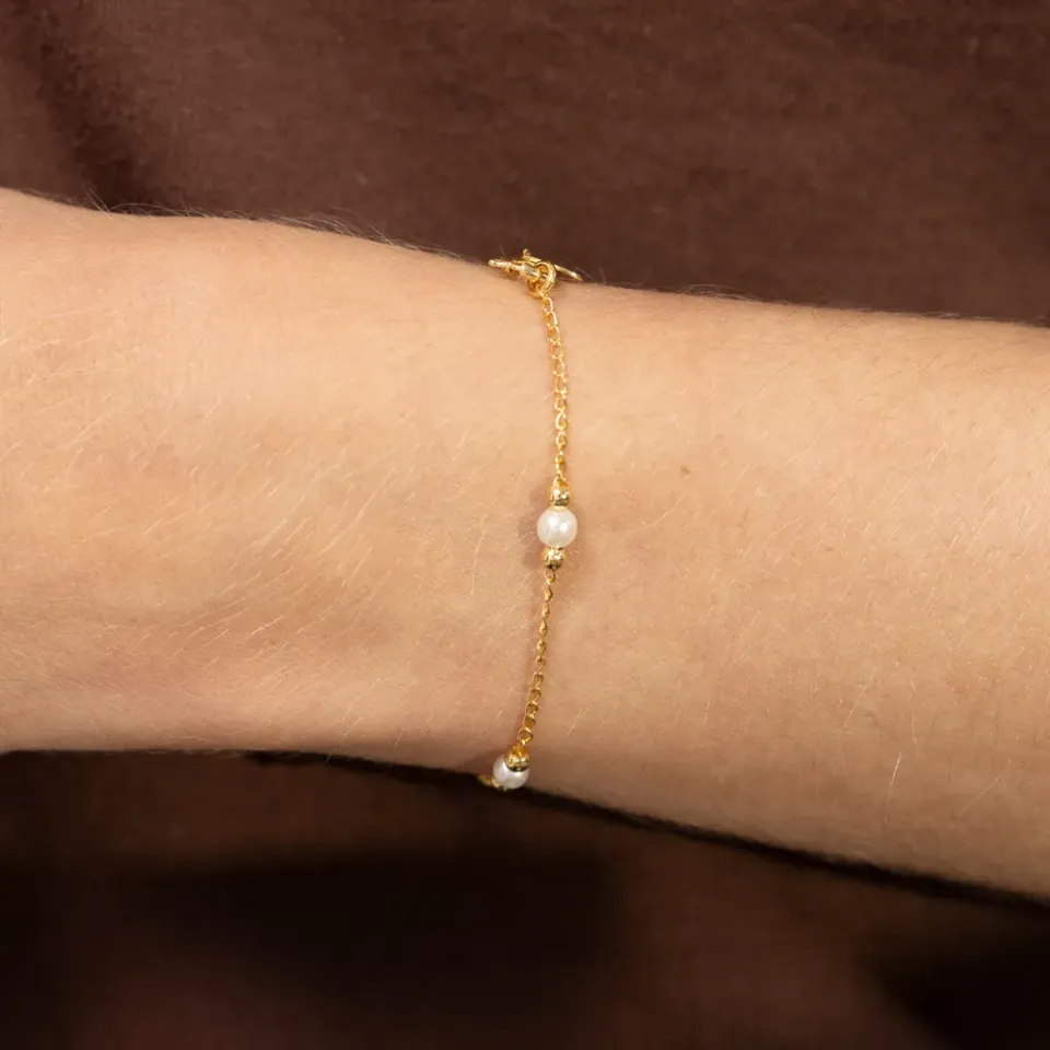 PULSEIRA INFANTIL PÉROLA E BOLINHAS LISAS BANHO OURO 18K
