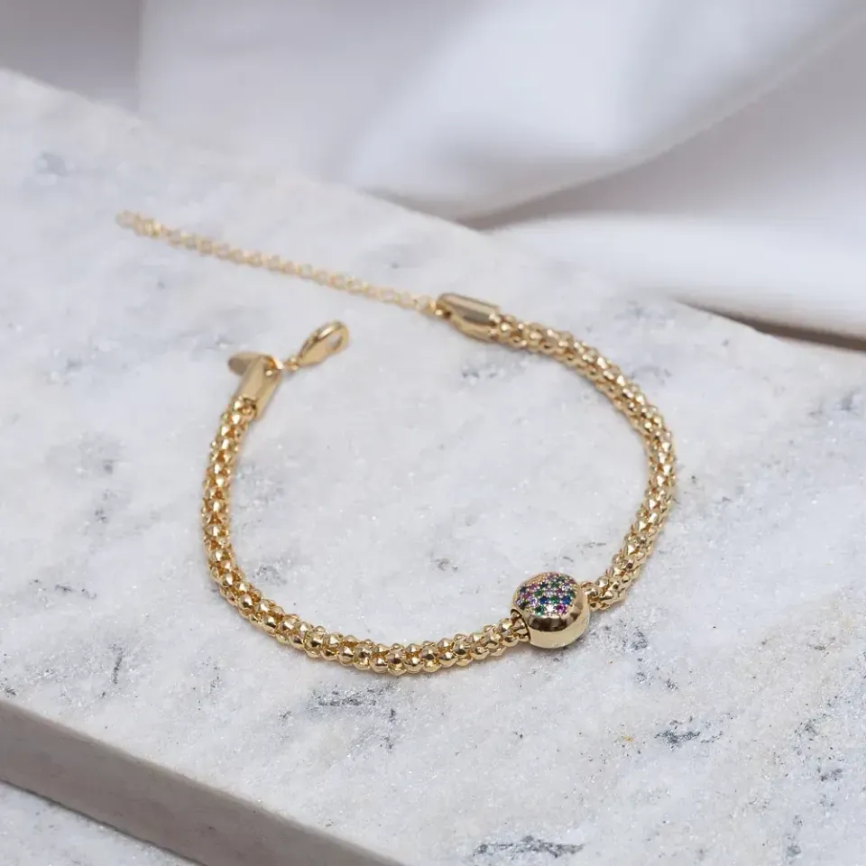 PULSEIRA OCA COM BERLOQUE CORAÇÃO BANHO OURO 18K