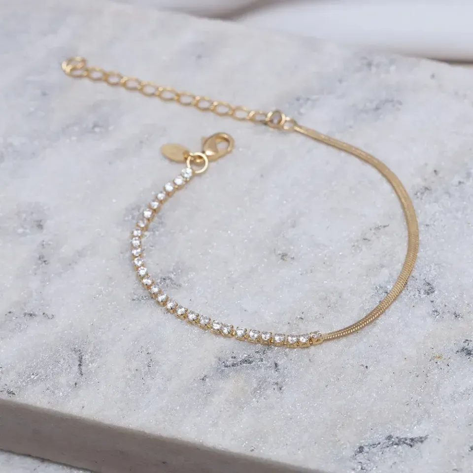 PULSEIRA FITA ESPELHADA E COM ZIRCÔNIAS BANHO OURO 18K