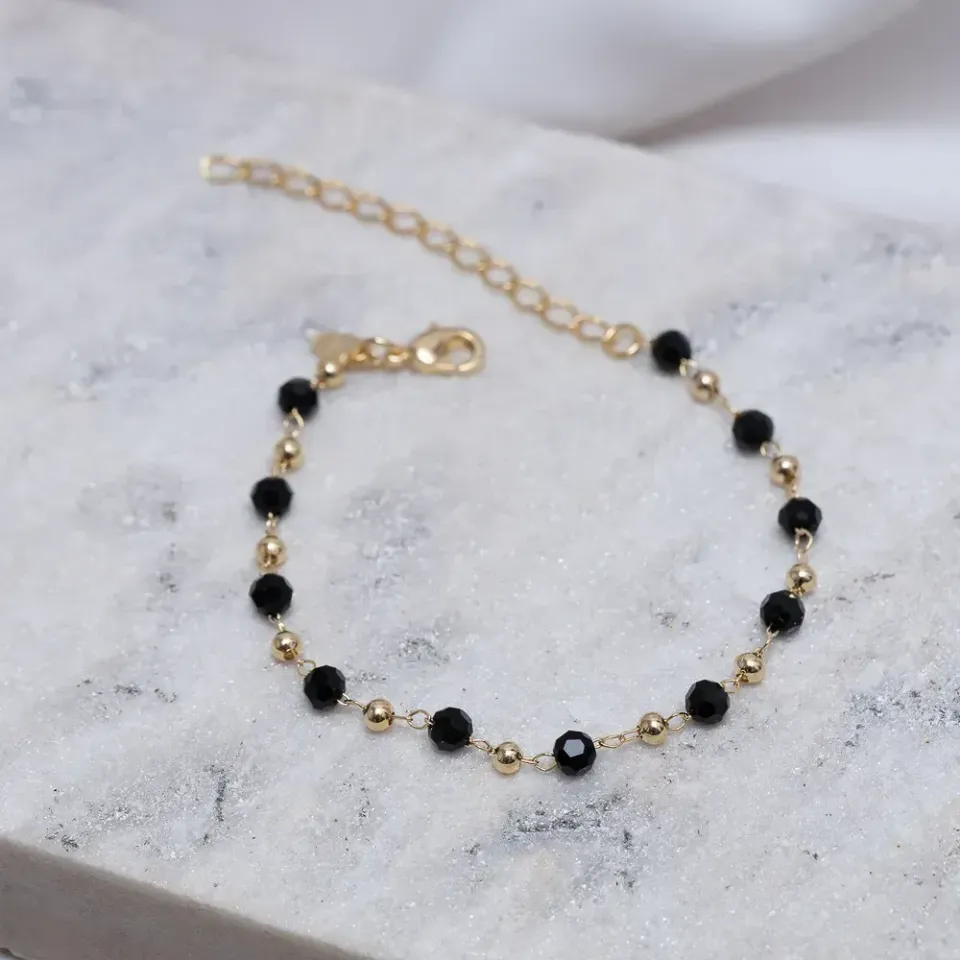 PULSEIRA BOLINHAS DOURADAS E NEGRAS BANHO OURO 18K