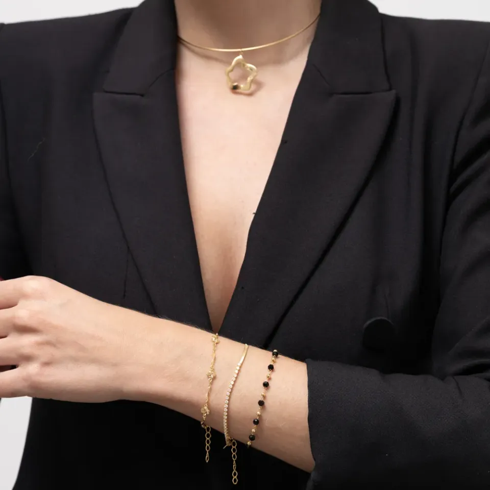 PULSEIRA BOLINHAS DOURADAS E NEGRAS BANHO OURO 18K