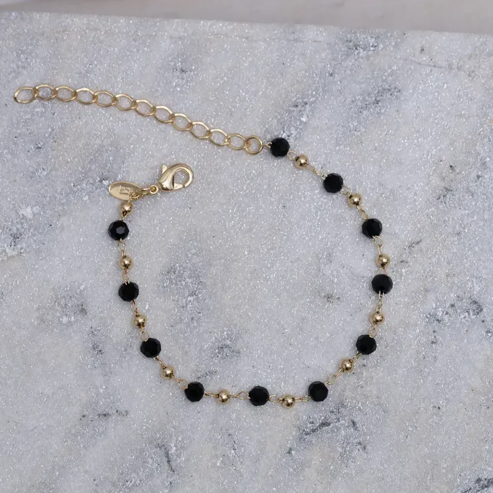 PULSEIRA BOLINHAS DOURADAS E NEGRAS BANHO OURO 18K