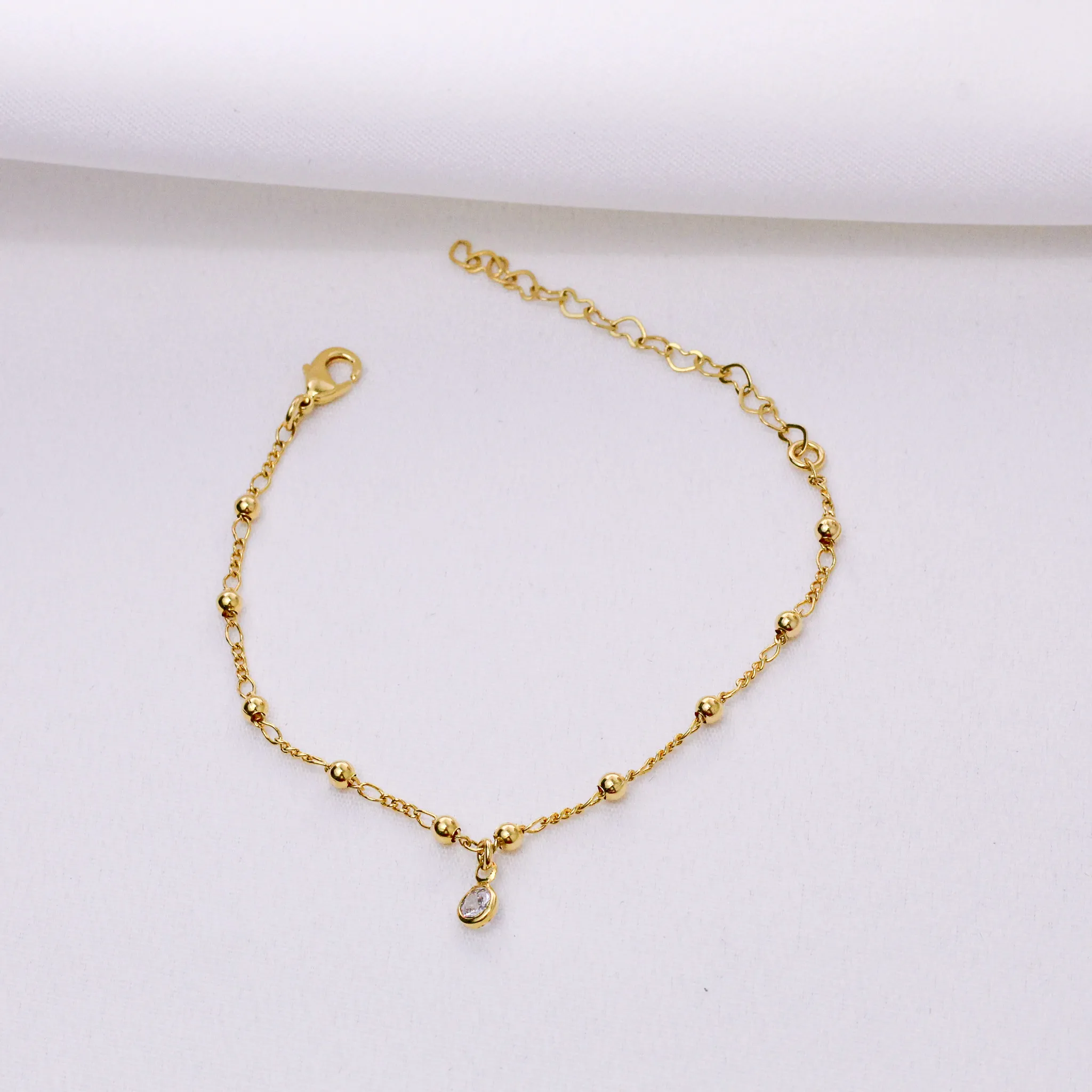 PULSEIRA INFANTIL BOLINHA COM ZIRCÔNIA PENDURADA BANHO OURO 18K