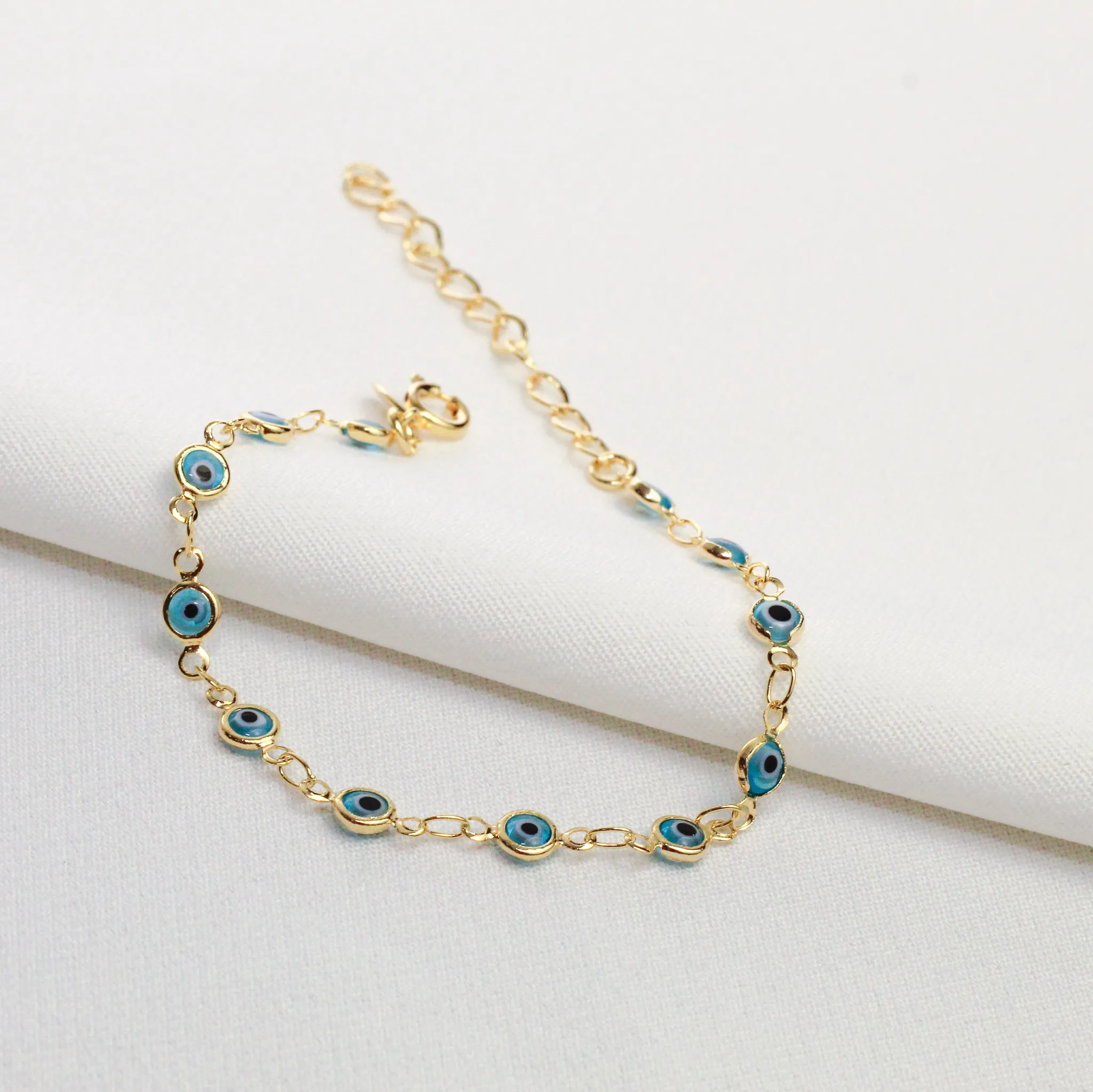PULSEIRA OLHO GREGO BANHO OURO 18K