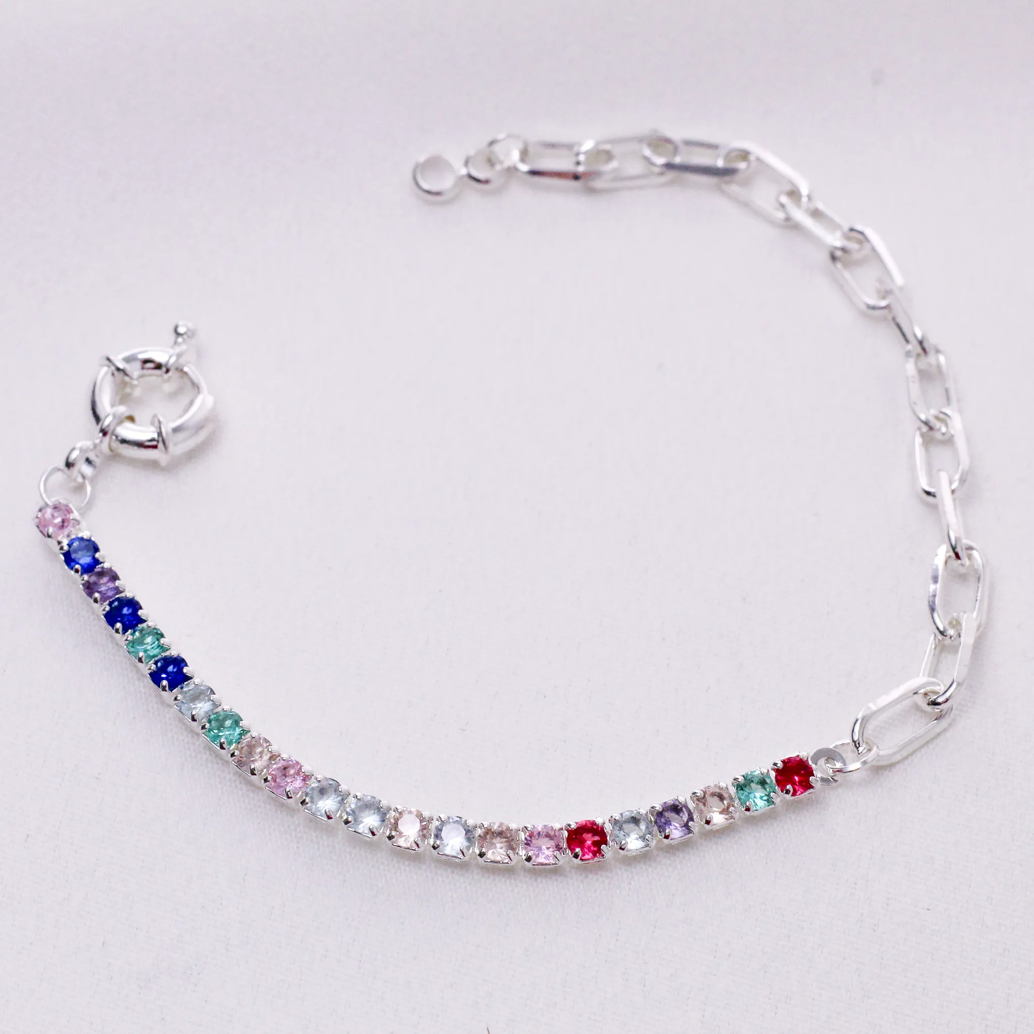 PULSEIRA ELOS COM ZIRCÔNIAS COLORIDAS E FECHO BOIA BANHO PRATA