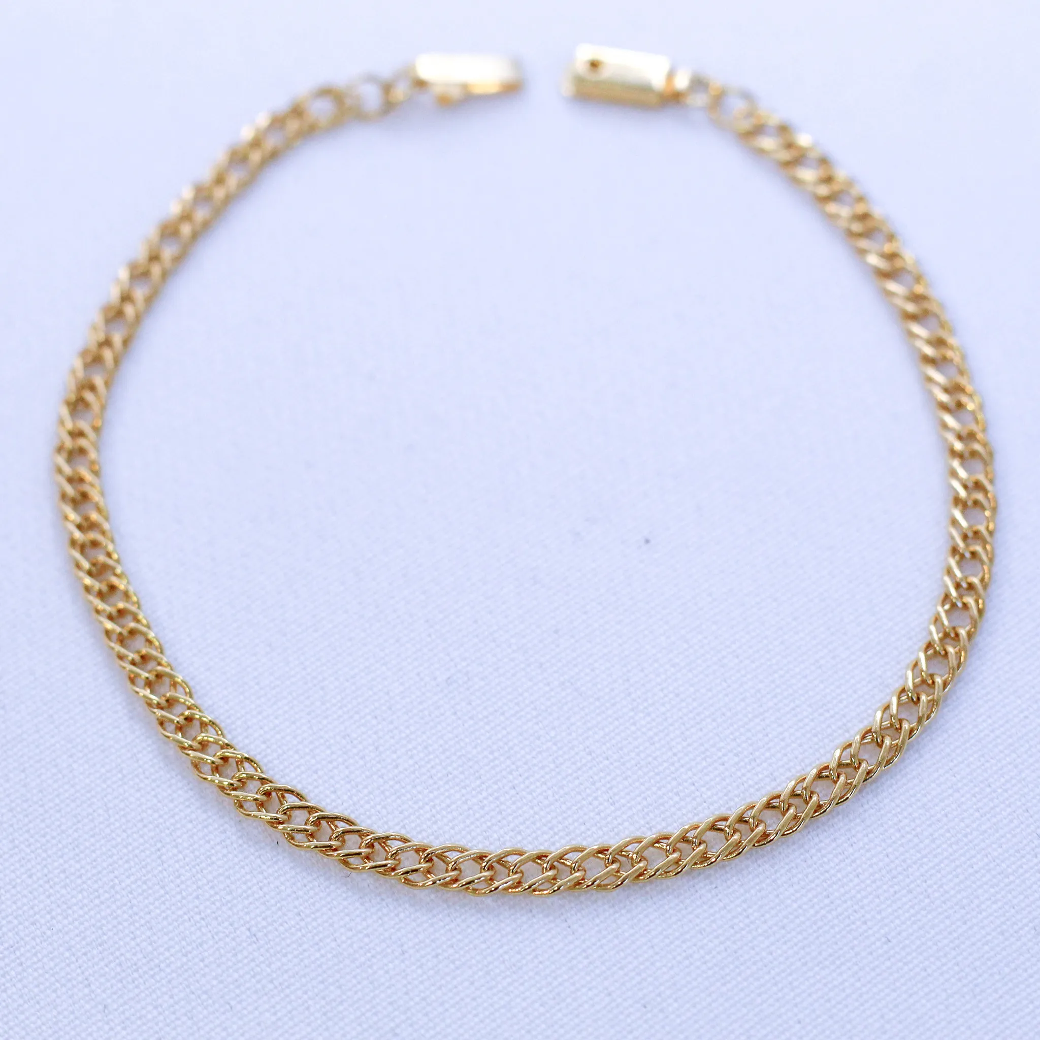PULSEIRA MASCULINA ELOS ENTRELAÇADOS BANHO OURO 18K