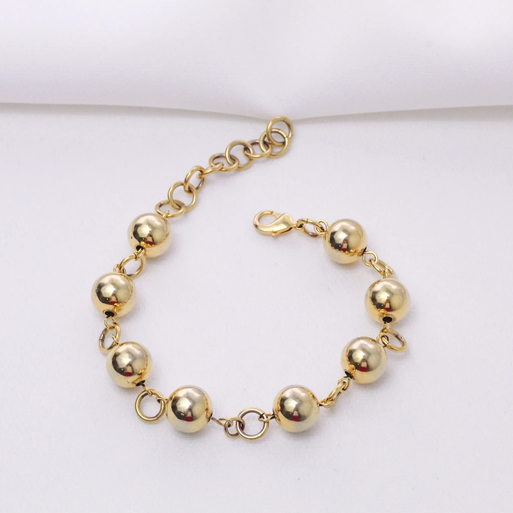 PULSEIRA ELOS COM BOLAS LISAS BANHO OURO 18K