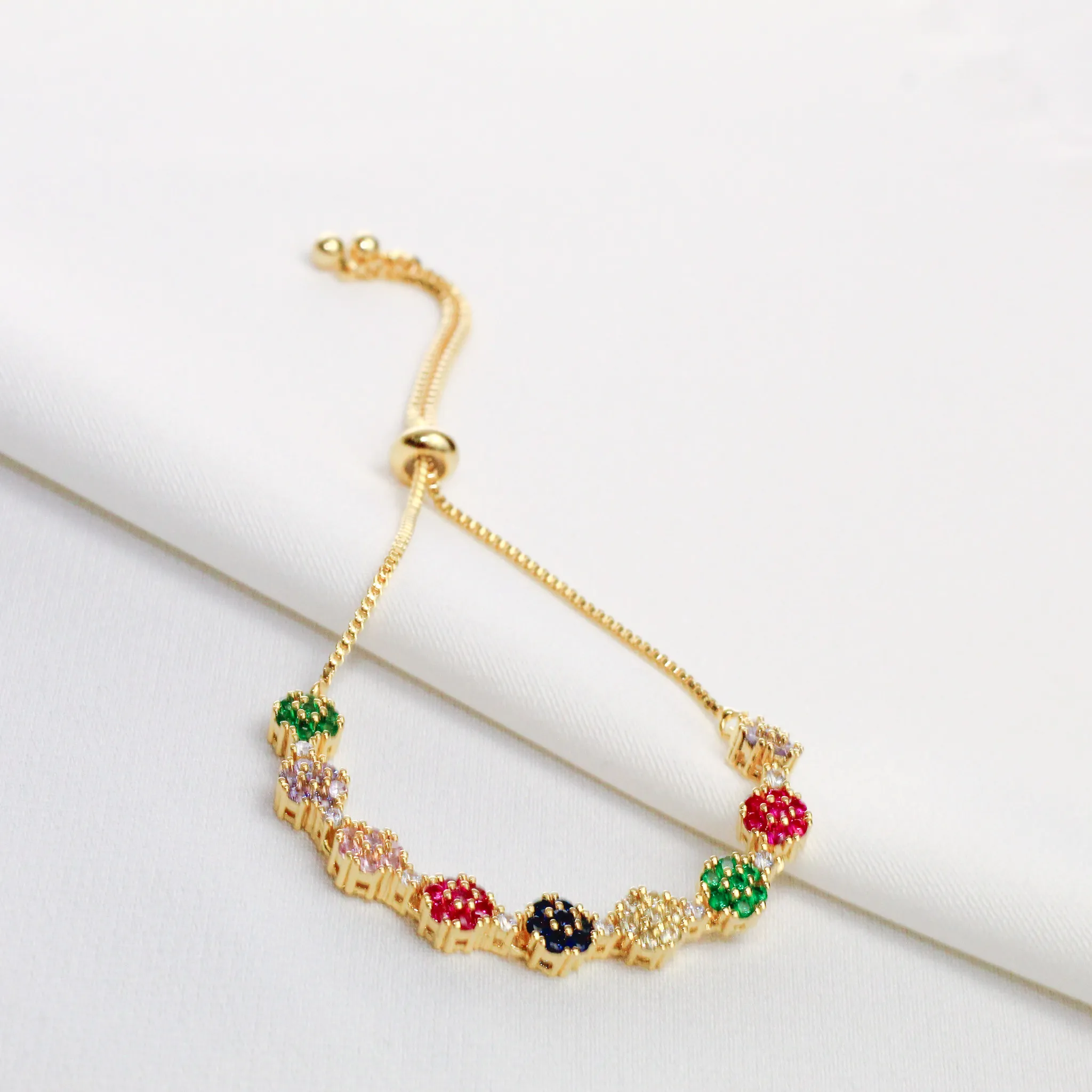 PULSEIRA  FLOR EM ZIRCÔNIA COLORIDA BANHO OURO 18K