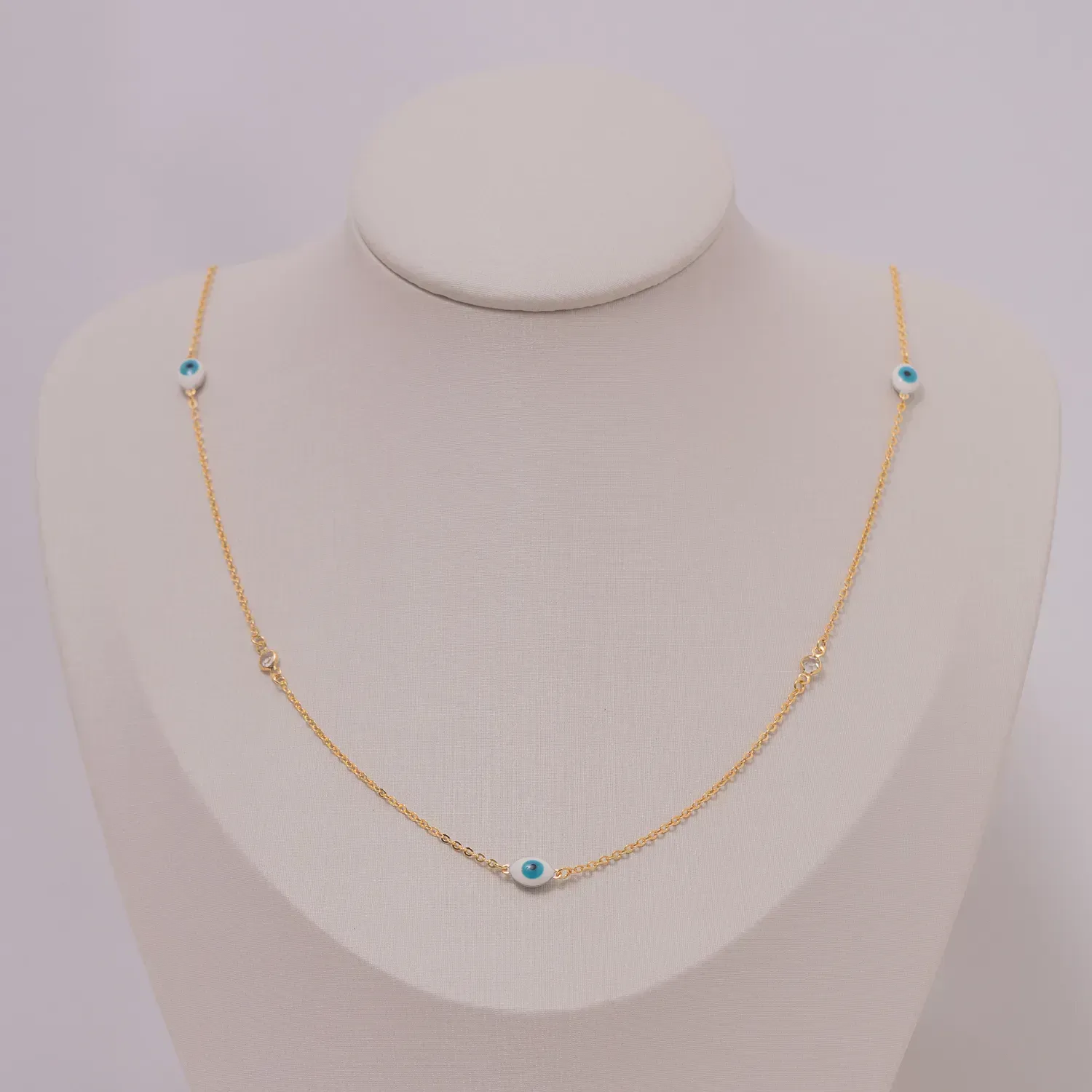 COLAR OLHO GREGO LONGO BANHO OURO 18K