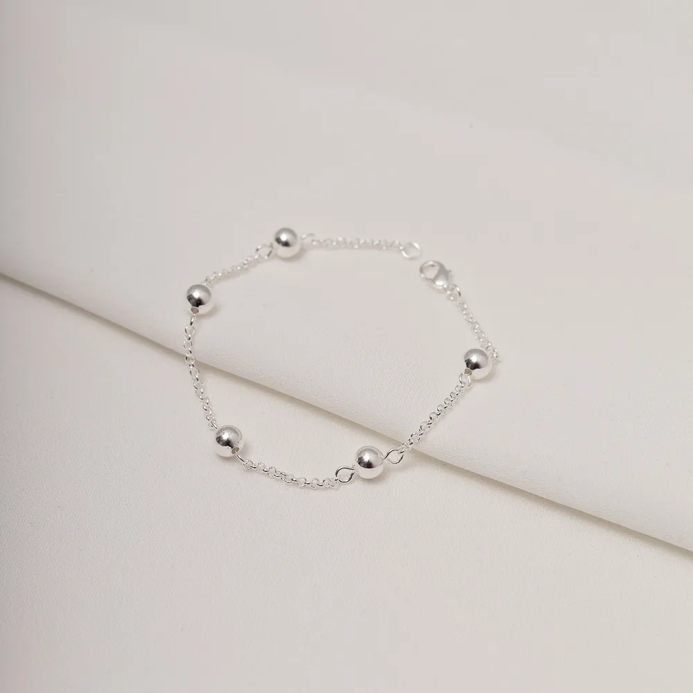 PULSEIRA BOLINHAS LISAS M BANHO PRATA