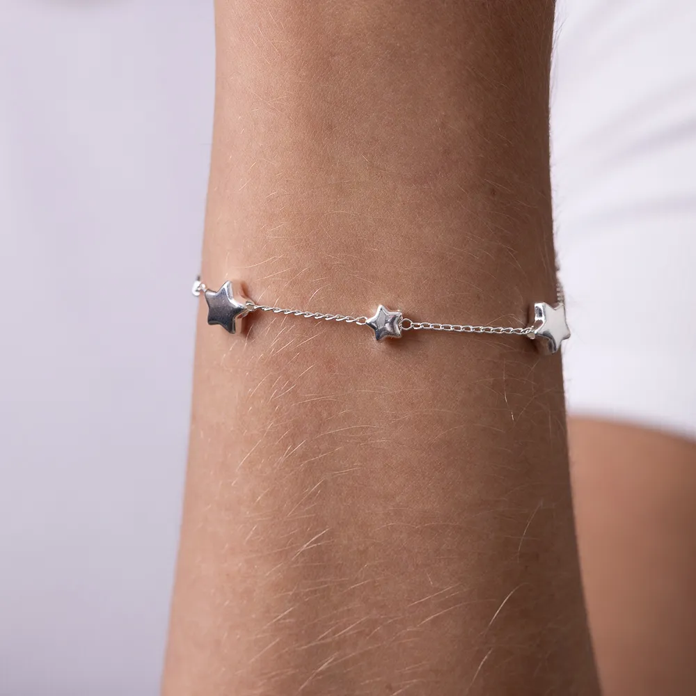 PULSEIRA ESTRELAS LISAS BANHO PRATA